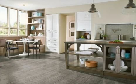 medium toned flooring in farmhouse style kitchen